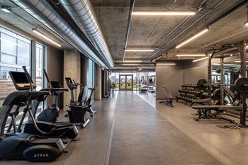 Unlimited fitness center with cardio, strength training and free weights
